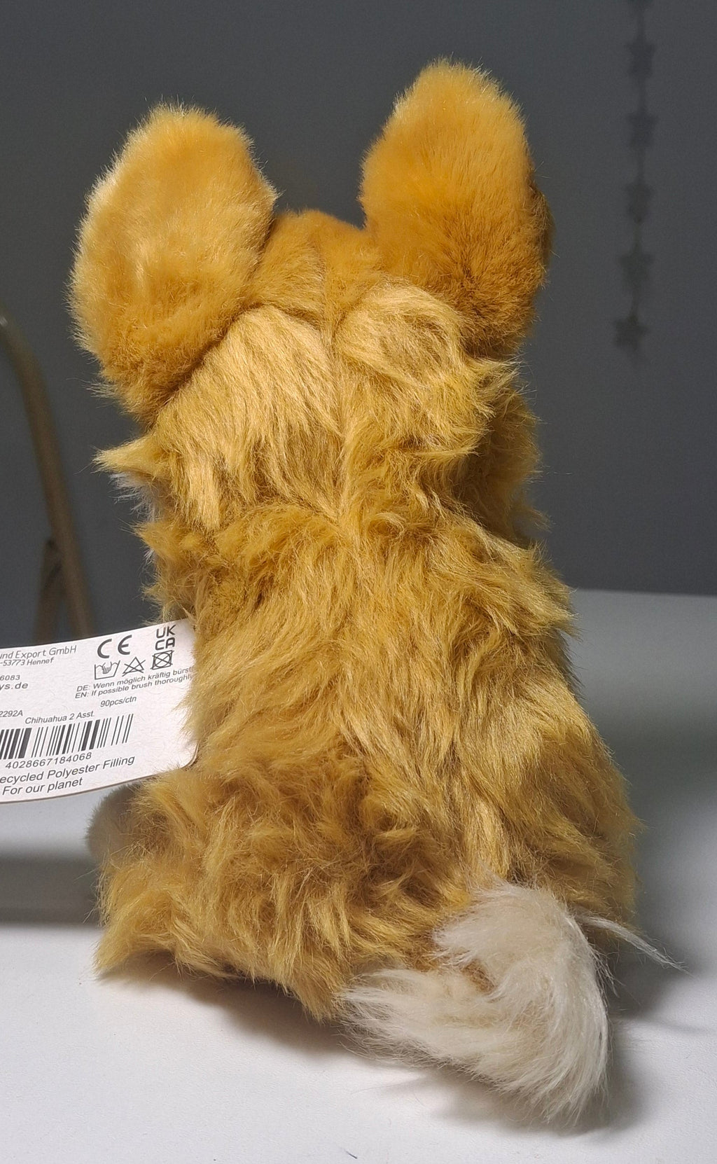 Peluche caniche de pelo largo de 18cm